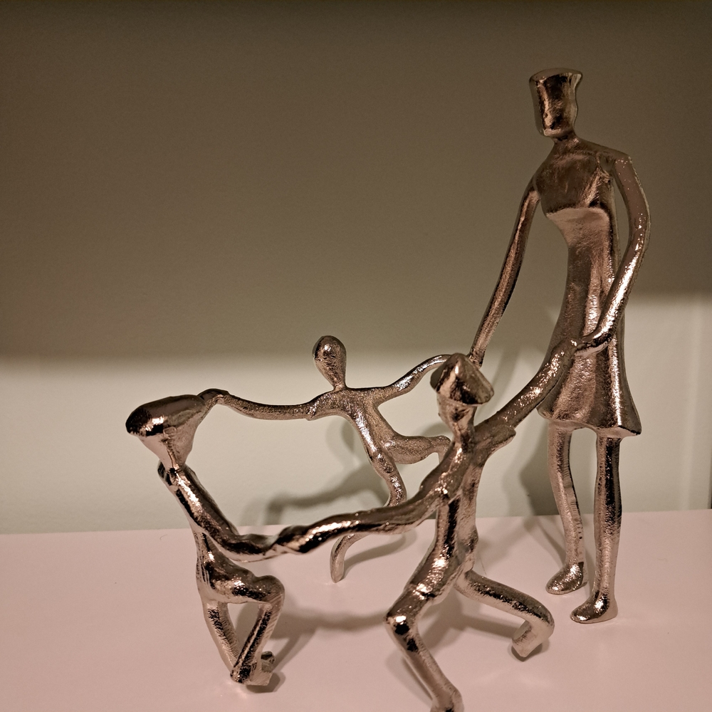 DAYNA B. Mother playing with children sculpture
